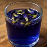 Glass of Brazilian Mounjaro drink with lemon and ginger