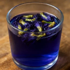 Glass of Brazilian Mounjaro drink with lemon and ginger